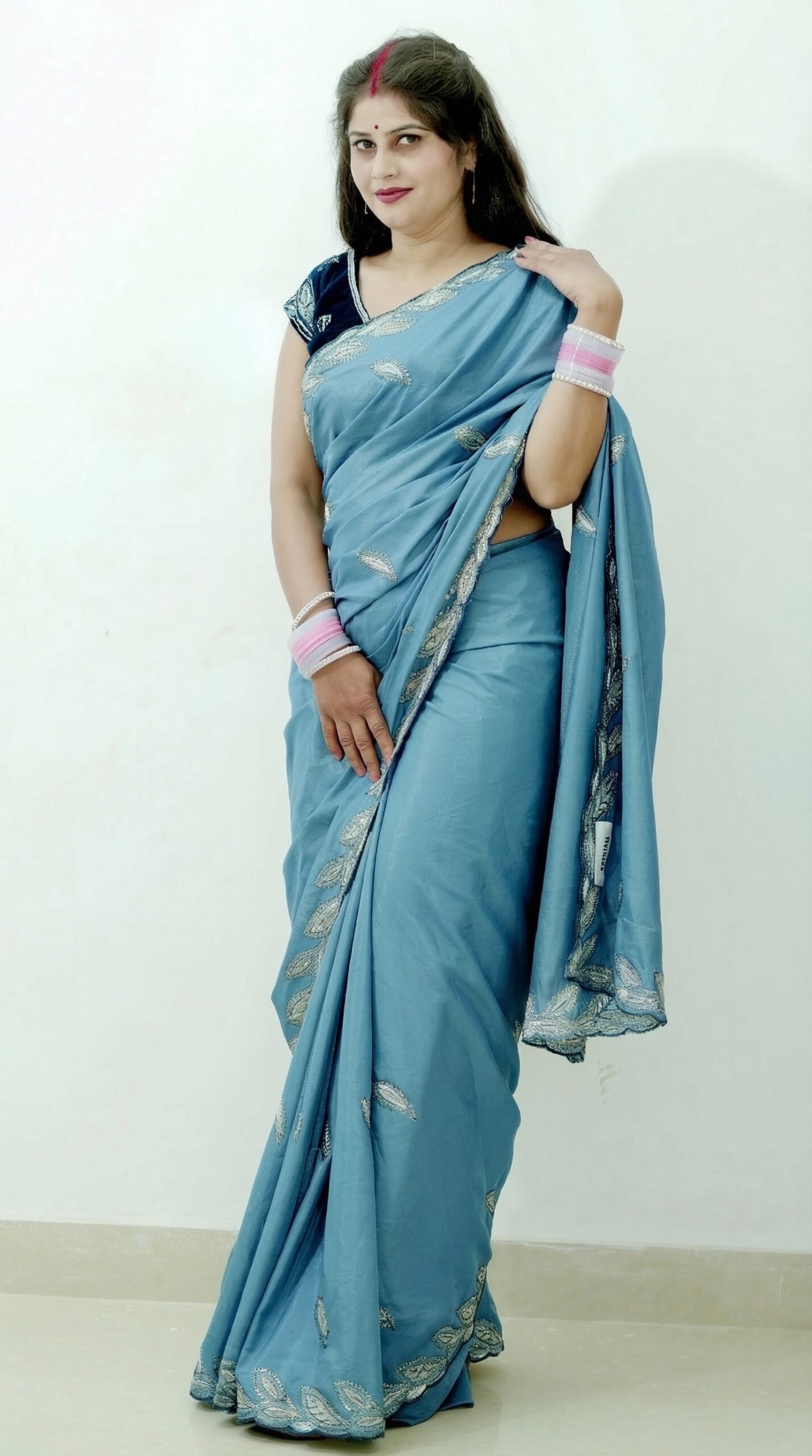 This_is_a_new_image_of_a_saree_with_the_base_color_delpmaspu